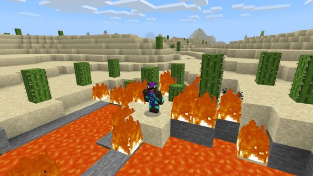 Игрок стоит в Майнкрафт среди огня